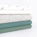 Stepp-Jersey – Ecru meliert