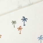 Frottee-Jersey – Palmen – Cremeweiß