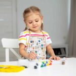 Schürze Charlie Cretonne Merzerisiert Pinsel Farben Warmweiß