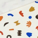 French Terry – leichter Kuschelsweat – Bunte Formen – Helles Natur