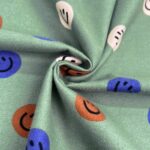 Baumwoll Flanell – Happy Faces – Dark Earth Green