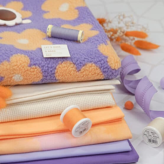 DIY Stoffmix - Garn - Reißverschluss - Label - Pompon