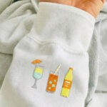 Stickmotiv Cold Drinks Pulloveraermel Kik